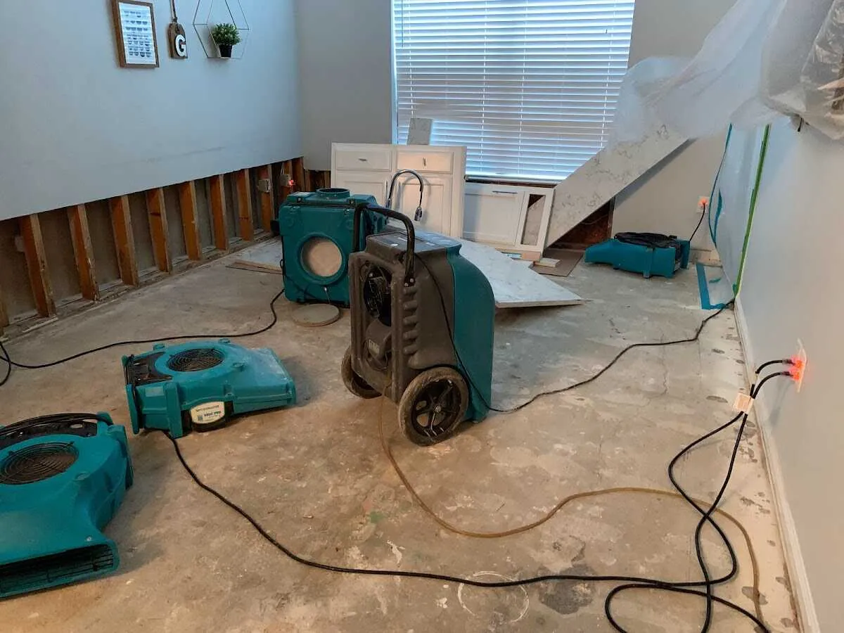 Dehumidifier in flood-cut room for Water Damage Restoration in Cold Springs
